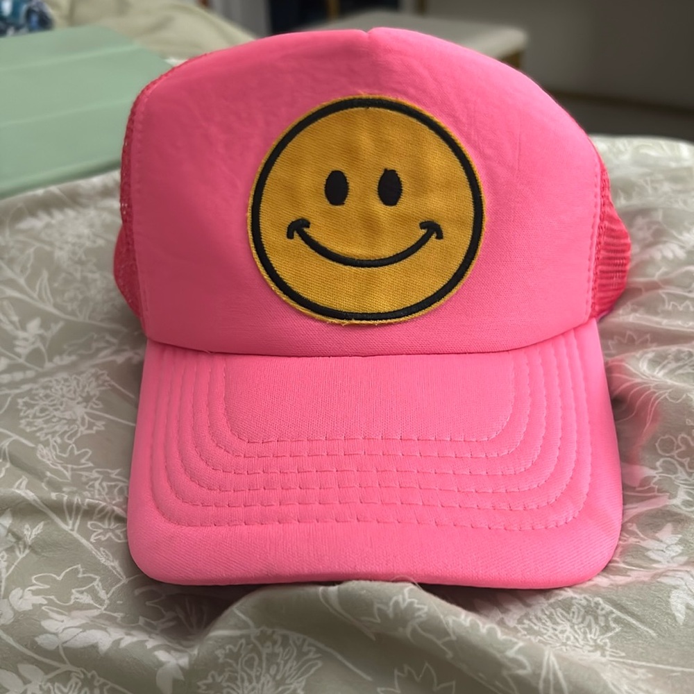 Pink smiley face hat